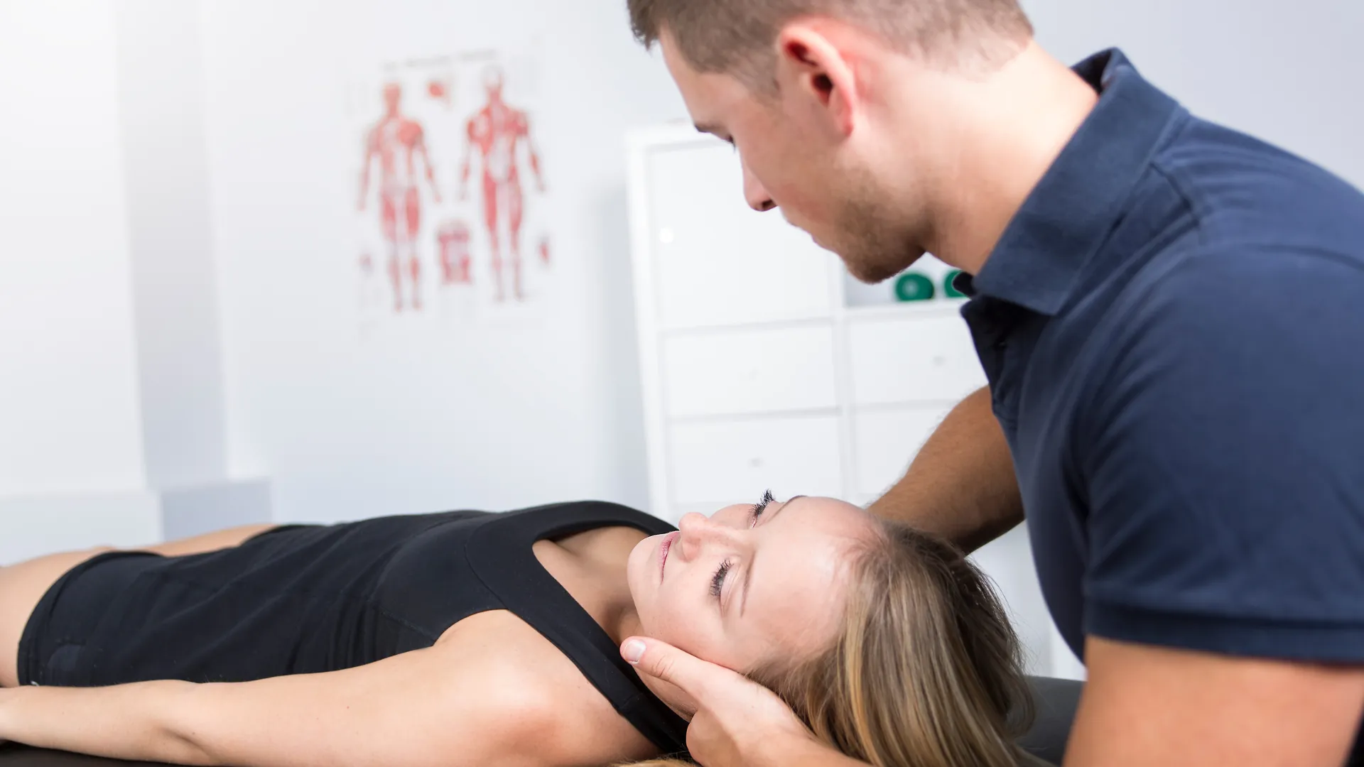 Woman holding her head due to dizziness
